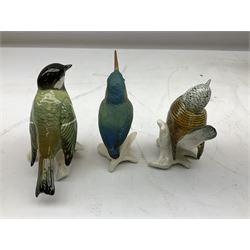 Six Karl Ens figures of birds, together with a Wallendorf figure of mother and child and four, Kunstporzellan bust of a baby and three other figure groups, tallest example H27cm
