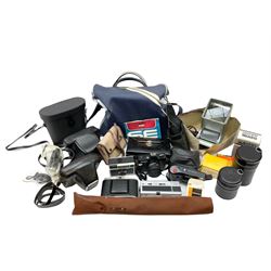 Quantity of Cameras , Lenses and Table Top Viewer- To be assessed 
Collection of cameras, lenses and photography equipment, to include Praktica EE2, Kowa SE, Kodak 66 model II, Inovar, lens Carl Zeiss Jena DDR Flektogon 2.4/35, lens Pentacon Electric f/2.8 135mm, Sunpak auto 2020, tripod  etc, together with a pair of Mark Scheffel 10x50 field binoculars.  