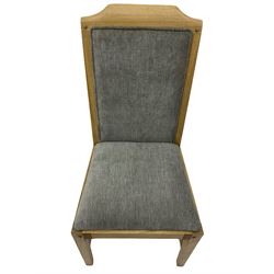 Windsor by Mark Devany oak rectangular extending dining table, with butterfly leaf, and four chairs with upholstered seats and backs