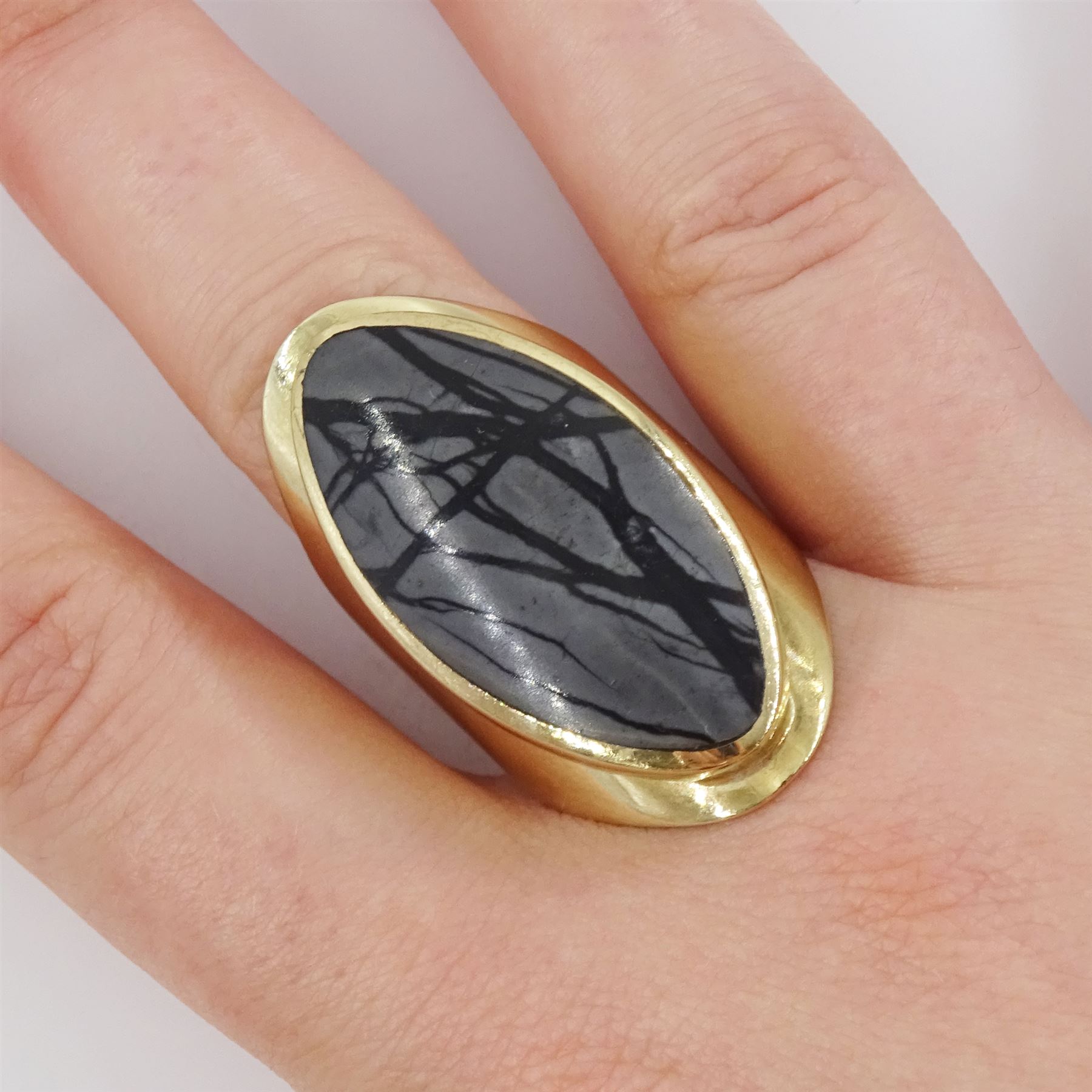 9ct gold Picasso jasper ring, single oval cut jasper, set within an openwork gallery by C W Sellors, Sheffield 1997