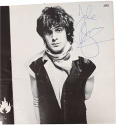 Signed Stiff Little Fingers promotional card, signed by four members of the band Jake Burns, Henry Cluney, Ali McMordie and Jim Reilly, two unsigned promotional cards,  'Go For It' 1981 tour programme and a collection of photographs from the gig