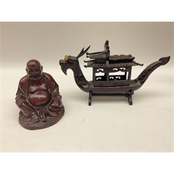 Small Oriental carved wood figures to include seated Buddha example, and a quantity of brass to include pair of candlesticks and cannons etc