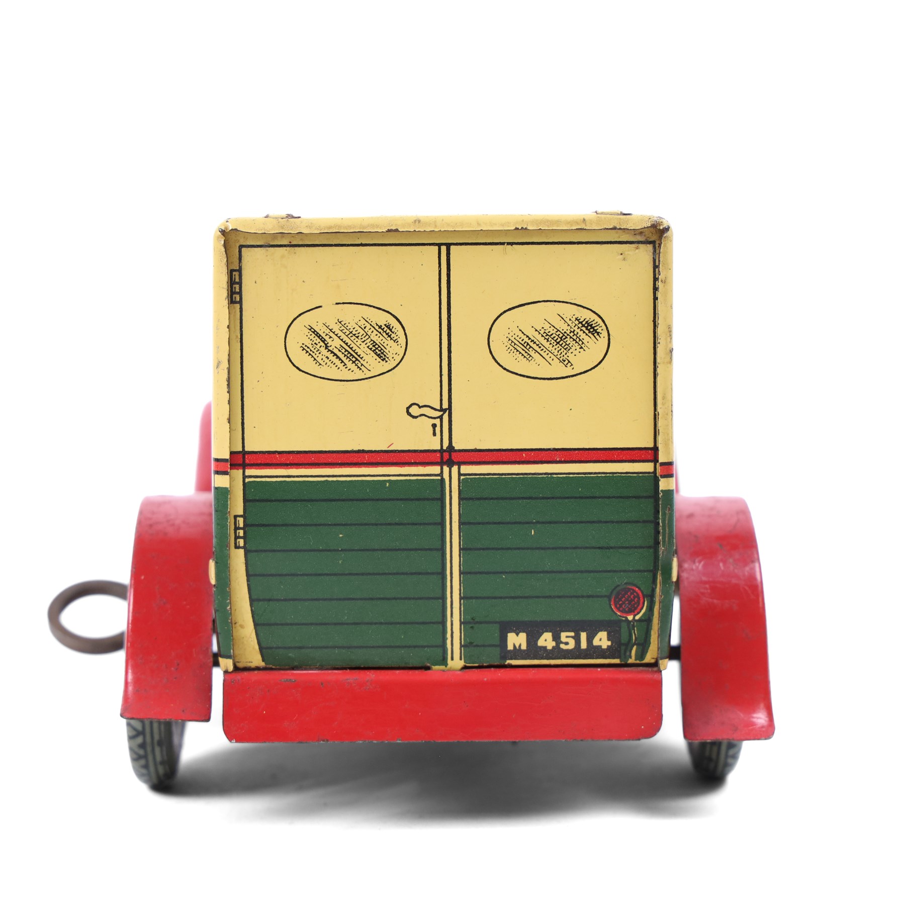 Wells Brimtoy tinplate clockwork 'Express Transport' delivery van, green body with cream roof and red highlights, with lithographed details, fixed key, H7.5cm, L17cm