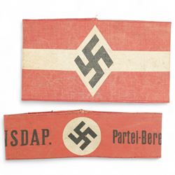 German WWI leather belt, the buckle marked 'Gott Mit Uns' surrounding a crown, a Third Reich webbing belt and buckle encircling eagle and swastika, NSDAP arm band and another