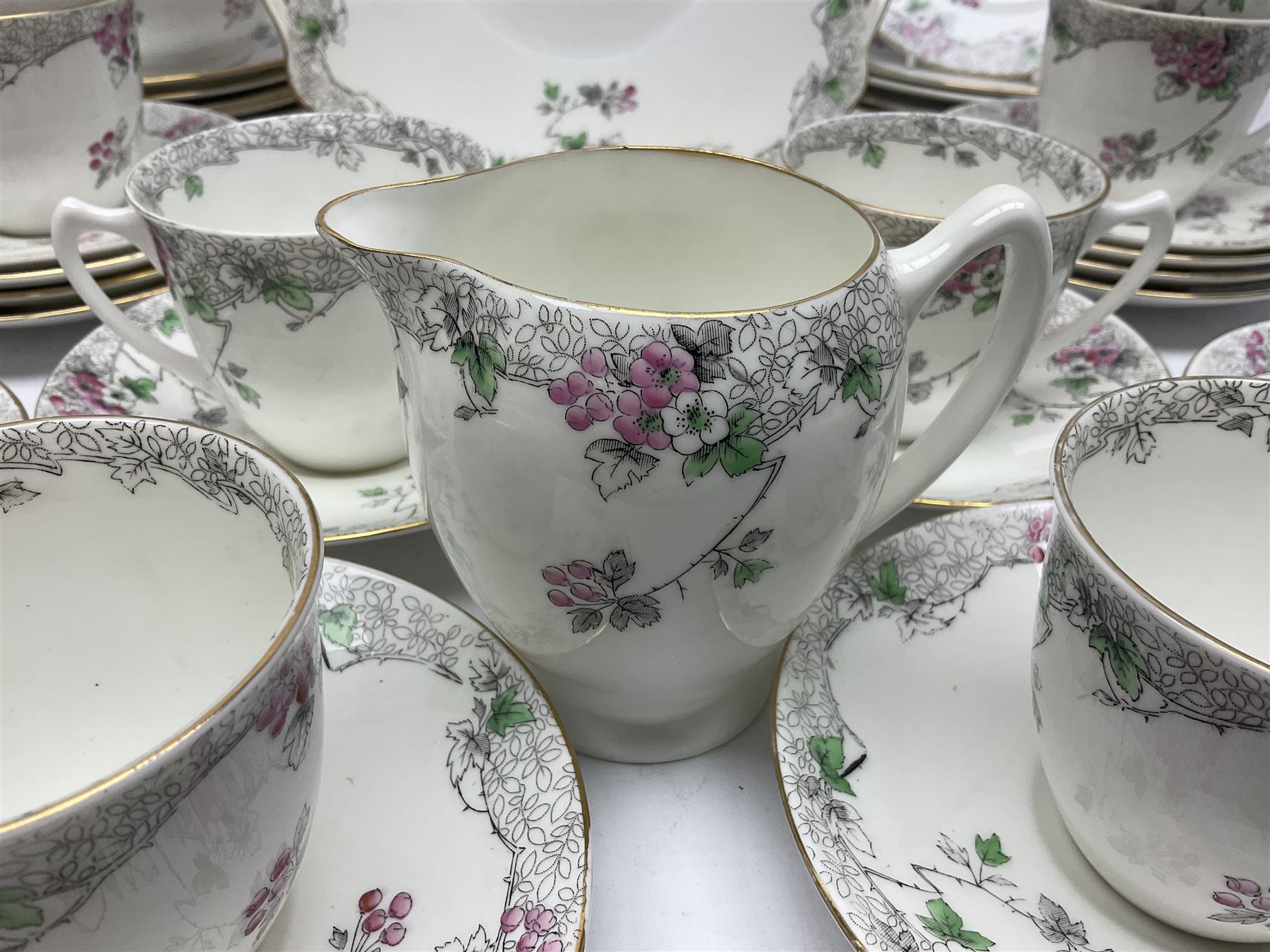 Shelley Bramble Rose pattern tea service, comprising milk jug, open sucrier, ten cups and twelve saucers, twelve dessert plates and two cake plates (38)