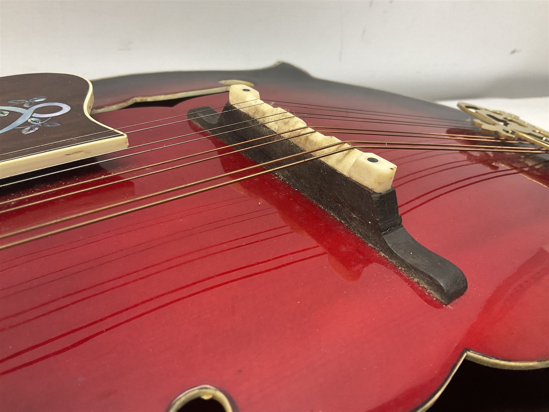 Eastern eight-string mandolin with red sunburst finish and mother-of-pearl inlay of eagles, clouds, trees etc L86cm; in fitted hard carrying case