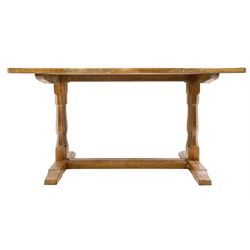 'Eagleman' oak dining table with adzed rectangular top, twin octagonal pillar supports joined by floor stretcher, relief carved inset Eagle signature, by Albert Jeffray of Sessay, Thirsk
