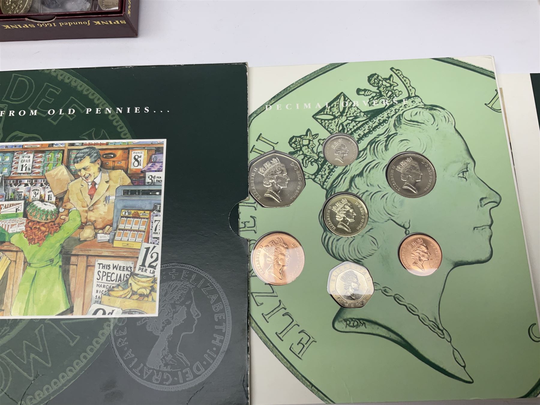 Commemorative and other coinage, including various Queen Elizabeth II 'London 2012 sports collection' fifty pence coins on cards, commemorative crowns, Millennium 2000 'Time Capsule' coin set, channel islands old round one pound coins, part sets etc