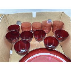 Quantity of glassware to include cranberry glass, Stuart pedestal dish, decanters etc in four boxes