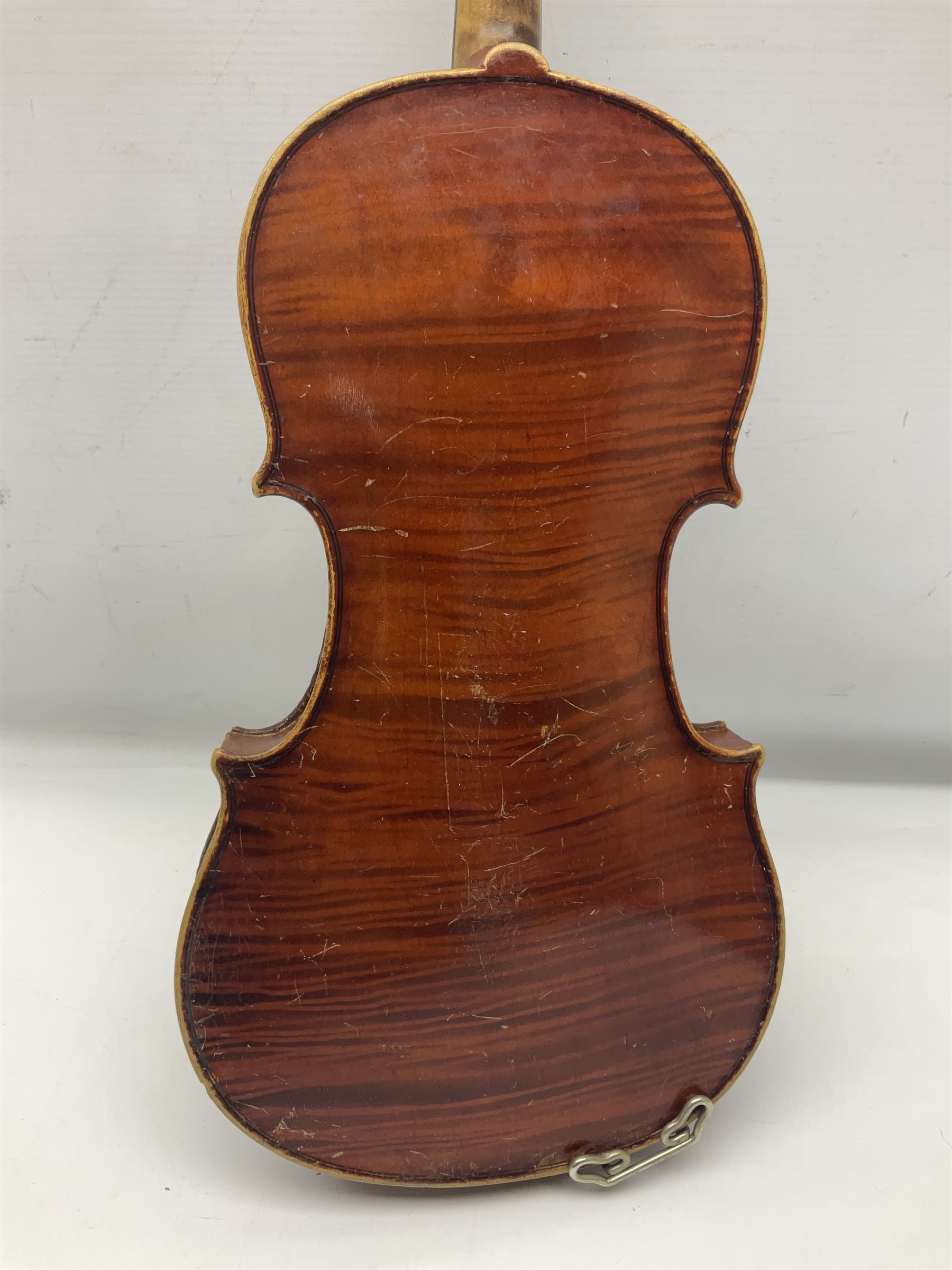 Early 20th century German Saxony three-quarter size violin with 34cm one-piece maple back and ribs and spruce top L55.5cm overall; in ebonised wooden 'coffin' case with bow