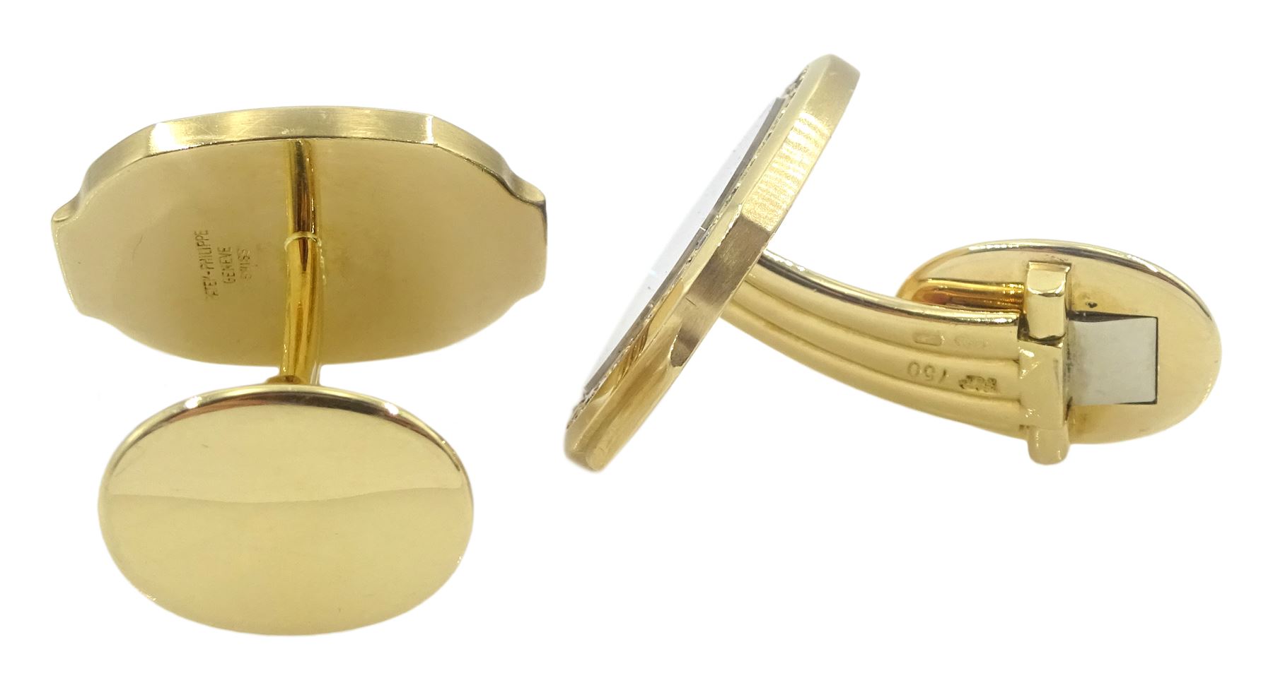 Pair of Patek Philippe Nautilus 18ct yellow gold and diamond cufflinks, with sapphire crystal, black-grey centre and diamond-set front, hallmarked, in original box