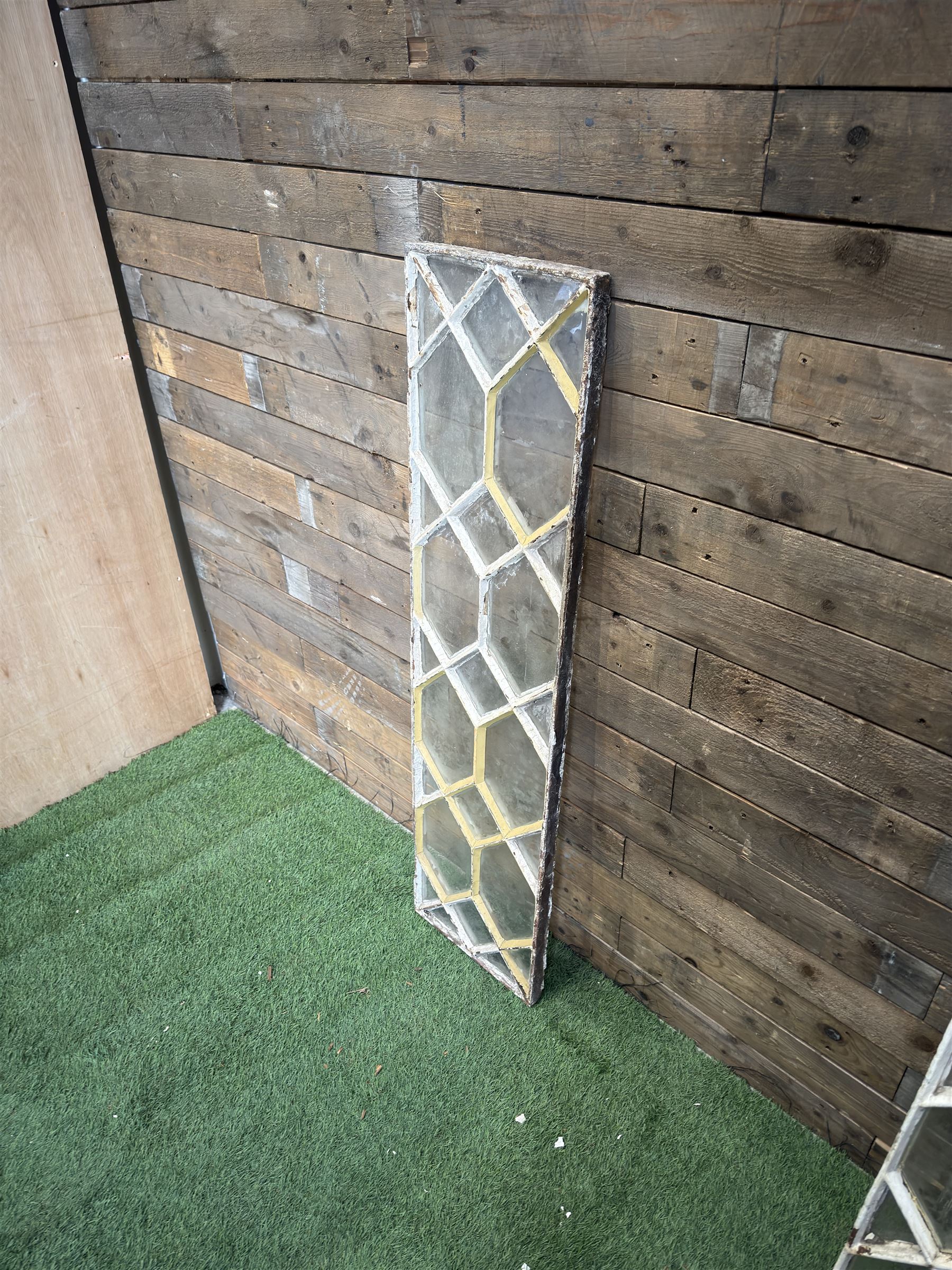 Four 19th century cast iron windows, lattice glazed in white painted finish, 