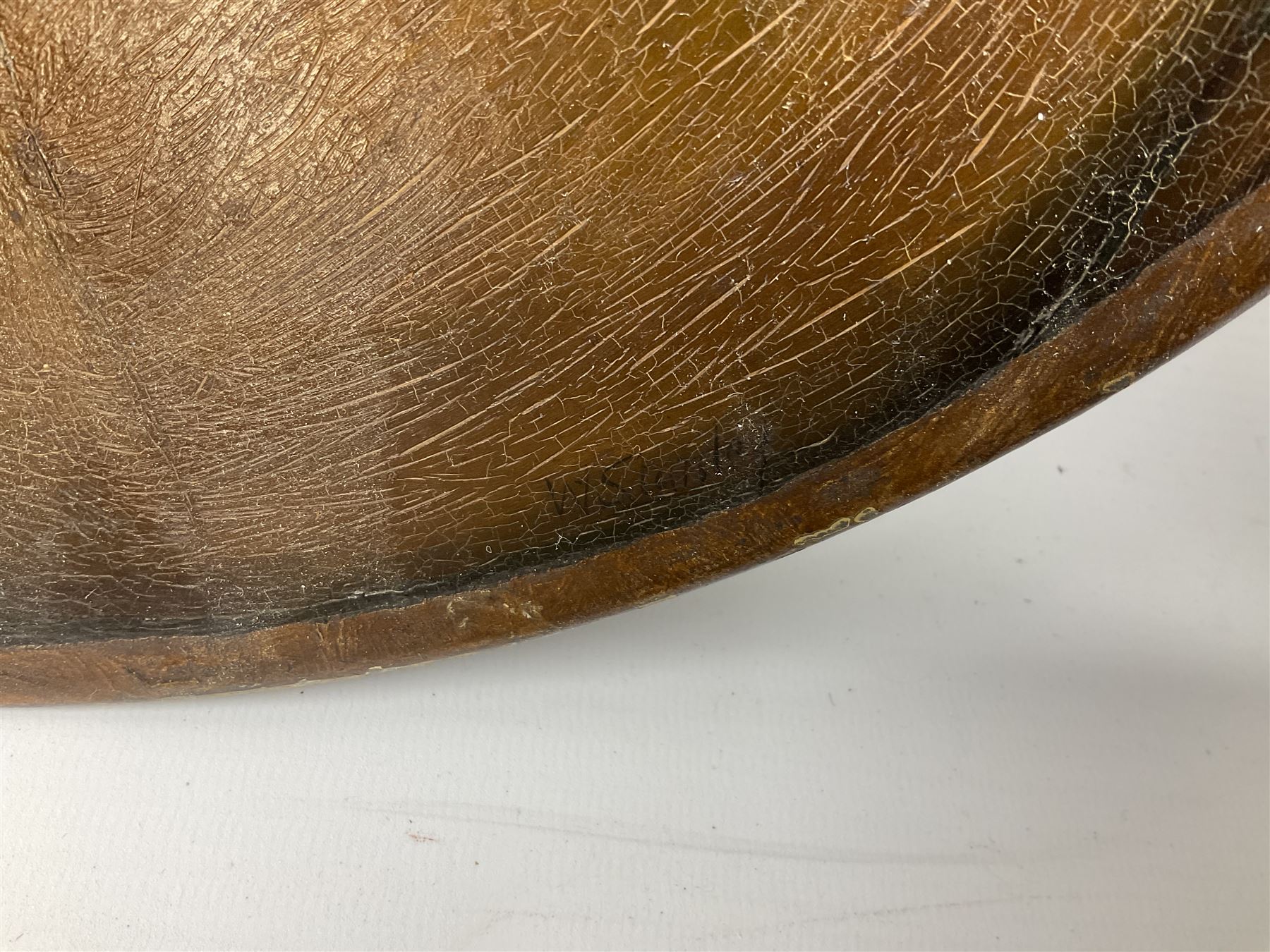 Two oil painted chargers decorated with joyful gentleman, both signed W Stanley, together with a Musterschutz charger decorated in high relief