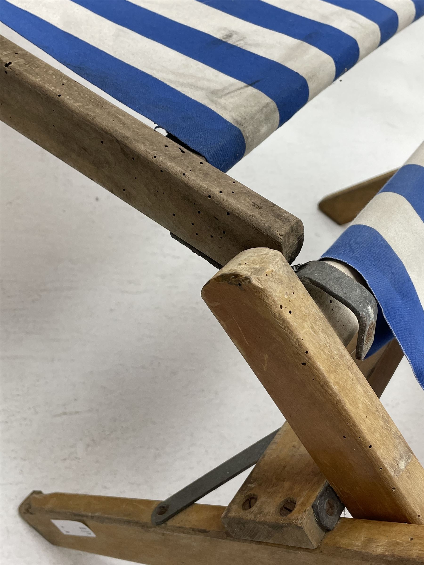 Geebro - ‘The Ocean Chair’ two vintage beech framed folding deck chairs with blue and white striped fabric 