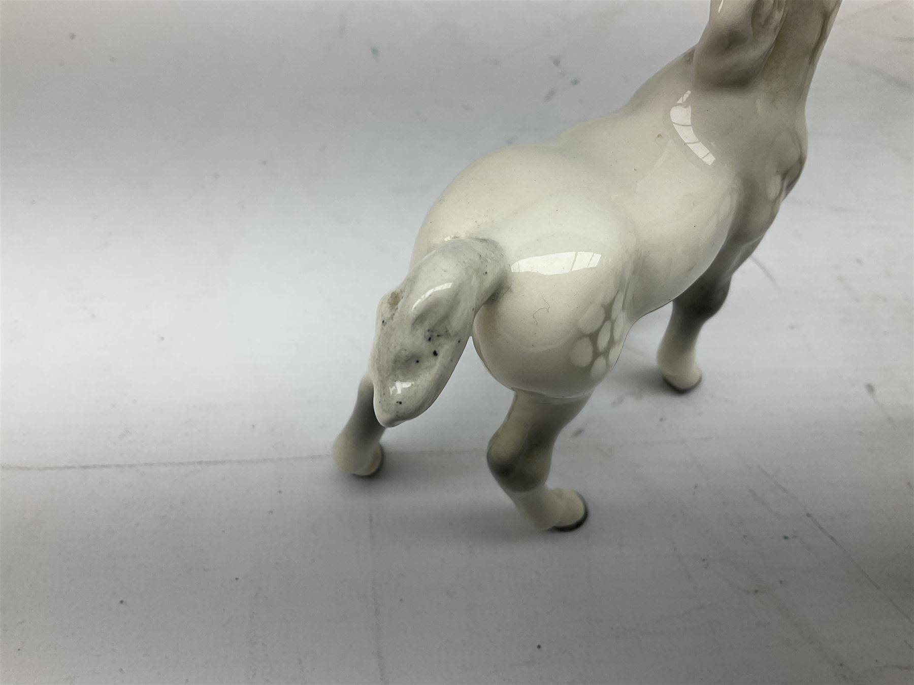 Seven Beswick figures of horses, including Connemara pony in grey no.1641, Arab in bay no.1265, large foal in grey no.947 etc, together with a Goebel figure of a horse (8)