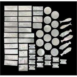 Collection of fifty seven Chinese mother of pearl gaming counters or tokens, of various size and form including rectangular, circular and fish shaped examples, various decoration including floral motifs, largest rectangular examples L6cm