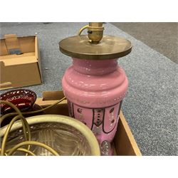 Bohemian style red overlaid glass cut vase, together with two cut glass bowls with metal rims, pink glass table lamp with painted floral decoration, etc