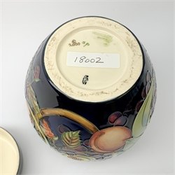 A Moorcroft ginger jar and cover, decorated in the Queen's Choice pattern by Emma Bossons, with impressed and painted marks beneath, H21cm. 

