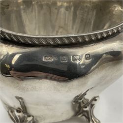 Five piece Edwardian silver tea service, comprising teapot and coffee pot, each with ebonised scroll handle, tea caddy with hinged cover, twin handled open sucrier, and milk jug, each of rounded bombe form, upon four paw feet, hallmarked William Adams Ltd, Birmingham 1904 and 1905, coffee pot H26cm
