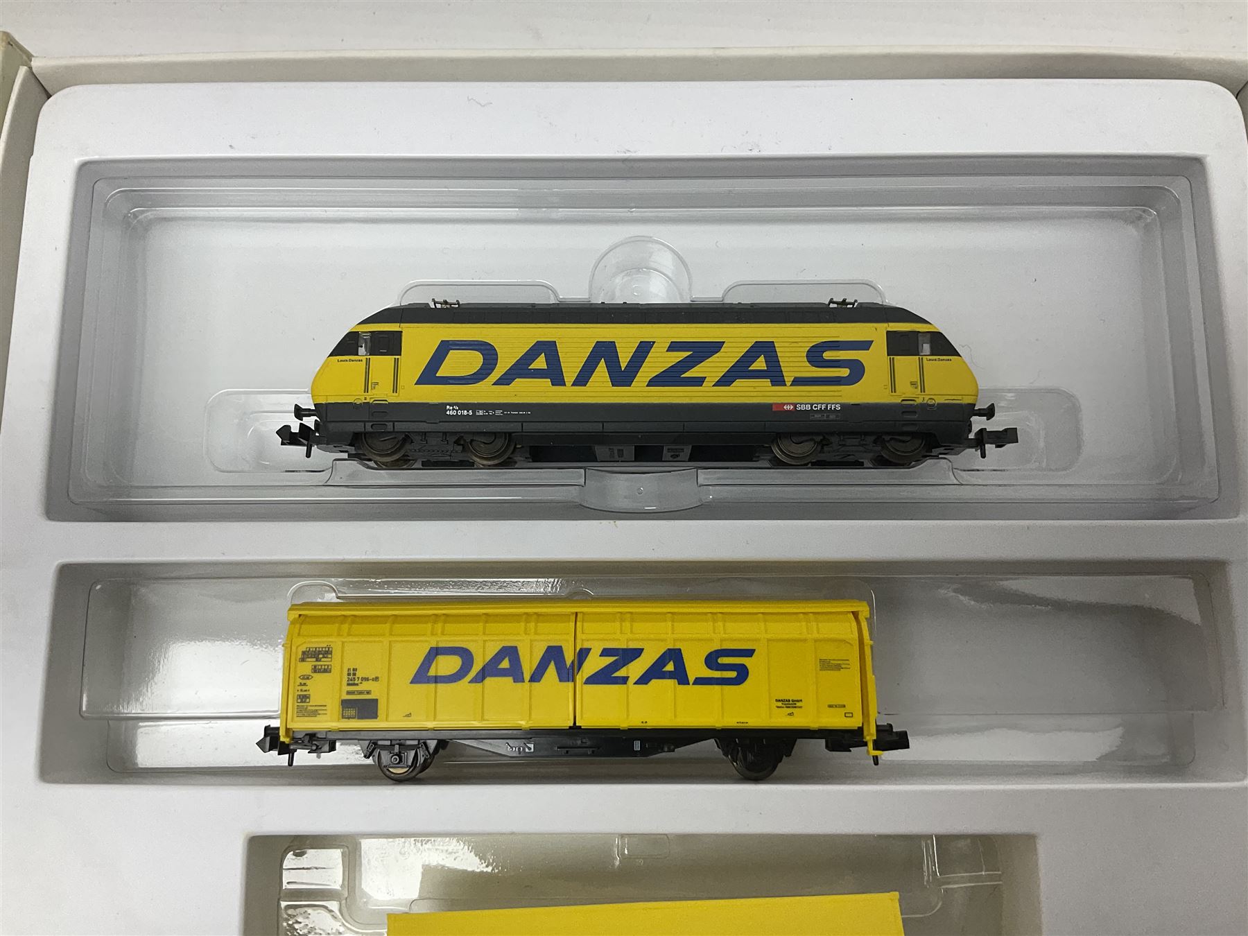 Trix Minitrix 'N' gauge - No.12363 'LINT' Diesel Powered Rail Car 'bendy' train; boxed; and No.11411 DB Zugset 'Danzas' goods set; boxed (2)