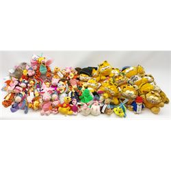 Over forty Walt Disney character soft toys including Tigger Pirate, Xmas Tree, Cowboy, Butterfly, Easter Rabbit etc, Eeyore Santa, Butterfly, Pirate etc, Piglet Lovebug, Valentine, Snowball etc; together with seventeen Garfield the Cat soft toys in various character costume including Skier, Graduate, Aviator, car rear window stickers etc