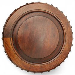 Pair of early 20th century Oriental hardwood barrel seats, of drum form with shaped apron and pierced panels, carved with stylised scrollwork and studded detail to the top