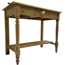 Pitch pine side table or washstand, raised back over rectangular top, fitted with single drawer, on turned supports united by undertier