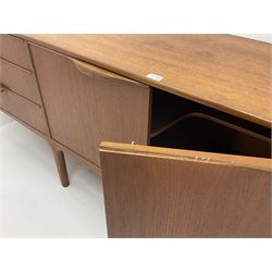 Mid 20th century A.H.McIntosh teak sideboard, central two cupboard door opening, flanked by three graduating drawers and fall front opening, all enclosing fitted interior, stile supports 