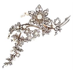 19th century gold and silver diamond and pearl en tremblant detachable brooch, the flower tremblant with a principal old cut diamond of approx 1.90 carat, the petals and stamen set with old cut and rose cut diamonds, total diamond weight approx 9.10 carat, to a foliate spray set set with further rose cut diamond and white / pink / cream pearls and ribbon tie