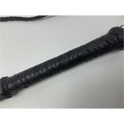 Near pair of short swords each with slightly curving 41cm fullered steel blade and all brass H-shaped hilt L52cm overall; plaited black leather whip; and reproduction pair of brass hilted swords, brass halberd blade and mace (7)