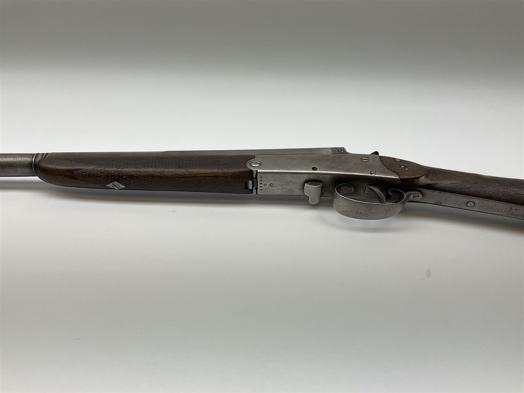 W. Horton 98 Buchanan Street Glasgow 20-bore single barrel centre hammer sporting gun, 71cm octagonal to round barrel with side lever opening, walnut stock with chequered grip and fore-end and steel butt plate, serial no.40334, L110cm SHOTGUN CERTIFICATE REQUIRED