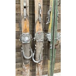 Two pairs of vintage skis, L207cm and 197cm