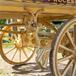 Advertising Trade Dray Wagon for C. Herring & Son, Hartlepool, Dated 1895 and Renovated 1975

An exceptionally decorative late Victorian horse drawn advertising trade dray, built by J. Herring of Hartlepool in 1895 and later renovated by C. Herring in 1975, as recorded by the painted inscription beneath the body. Finished in a striking cream and maroon livery with extensive hand painted signwriting, the wagon carries the name C. Herring & Son, Iron & Steel Processors, Hartlepool along its sides and rear panels. The wagon is fitted with a flat timber loading bed, twin shafts for a single horse, elegant spoked wooden wheels, iron bound tyres, rear headboard and traditional undercarriage with leaf spring suspension. Richly detailed scrollwork and lining throughout make this a particularly attractive example, suitable for collection, display, museum, promotional or coaching purposes.

Features

• Built by J. Herring, Hartlepool, 1895
• Renovated by C. Herring in 1975
• Original style hand painted advertising signwriting
• Flat timber loading platform
• Raised rear headboard with decorative pierced gallery
• Twin shafts for a single horse
• Wooden spoked wheels with iron tyres
• Traditional leaf spring suspension
• Extensive decorative lining and scrollwork throughout
• Attractive cream and maroon colour scheme
• Suitable for private collection, museum or display use

Dimensions:
Overall length: 560 cm
Body length: 300 cm
Width: 158 cm
Height: 150 cm

Wheel Diameters:
Front wheels: 76 cm
Rear wheels: 86 cm