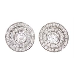 Pair of 18ct white gold round brilliant 