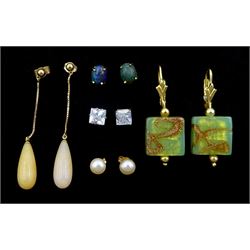 Five pairs of 9ct gold stud earrings including coral, cubic zirconia, opal, pearl and glass