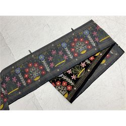 Large velvet crewel work wall hanging worked with bright colours with flowering planters within a stylised chain stitch border, L400cm approx