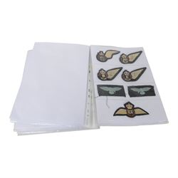 Collection of British cloth insignias, including RAF, Royal Navy/Marine and Parachutist examples 
