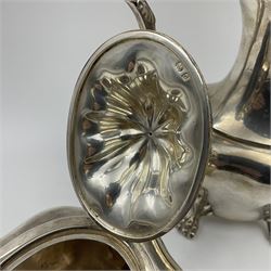 Five piece Edwardian silver tea service, comprising teapot and coffee pot, each with ebonised scroll handle, tea caddy with hinged cover, twin handled open sucrier, and milk jug, each of rounded bombe form, upon four paw feet, hallmarked William Adams Ltd, Birmingham 1904 and 1905, coffee pot H26cm
