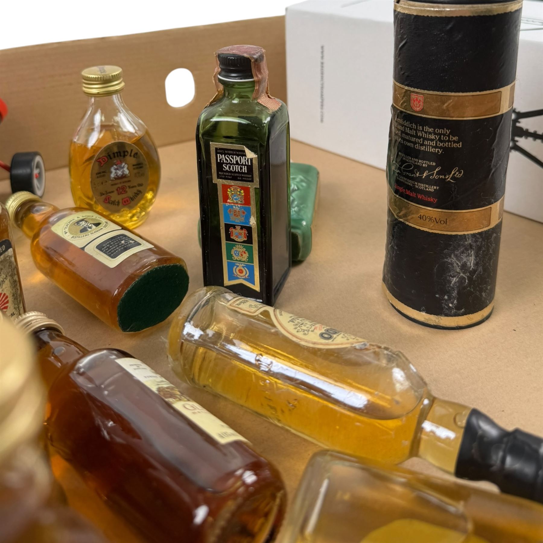 Collection of miniature whisky, including Glendronach 12 year old highland scotch whisky, Knockando 1975 pure scotch whisky, Isle of Jura pure malt scotch whisky etc, together with a bottle of Dow's Ruby Port, verious contents and proof  