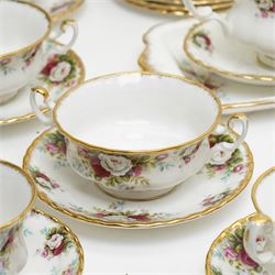 Royal Albert Celebration pattern tea and dinner wares, comprising covered tea and coffee pot, seven dinner plates, oval serving dish, gravy boat and saucer, nine coffee cups and ten coffee cup saucers, seven teacups and eight teacup saucers, eight soup bowls and saucers, rectangular serving tray, ten side plates, etc, approximately 88 pieces in total