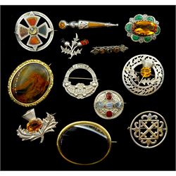 Three silver Scottish thistle brooches, collection of stone set brooches, mostly stamped or hallmarked and two gilt agate brooches