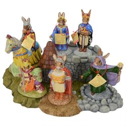 Royal Doulton Bunnykins, comprising of three complete sets;  The Arthurian Legend Set, with display plinth, Sir Gawain, Queen Guinevere, Sir Galahad, Merlin, King Arthur, Sir Galahad; Tudor set with display plinth, Henry VIII, Anne Boleyn, Jane Seymour, Catherine of Aragon, Catherine Parr, Anne Of Cleaves and Catherine Howard; The Occasions Collection: with display plinth, Christmas Morning, Wedding Day, Love Heart, Easter Treat, Birthday Girl, Congratulations, Graduation Day and Easter Parade, all with original boxes