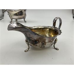 Silver plated seven bar toast rack by Mappin & Webb, together with other silver plated items including pair of bottle coasters, swing handled baskets and two sauce boats