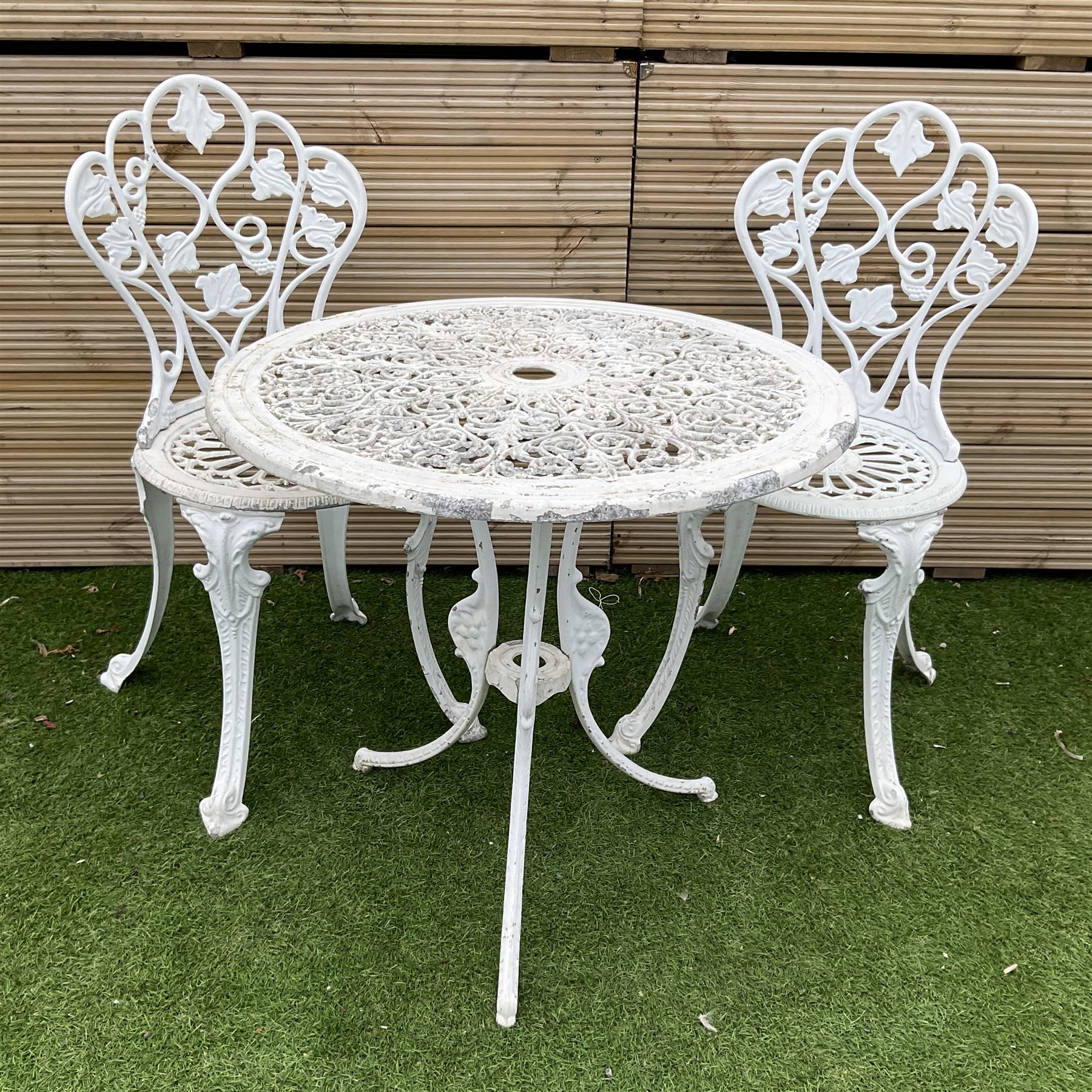 Victorian design - white painted cast aluminium garden table and two chairs - THIS LOT IS TO BE COLLECTED BY APPOINTMENT FROM DUGGLEBY STORAGE, GREAT HILL, EASTFIELD, SCARBOROUGH, YO11 3TX