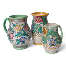 Charlotte Rhead for Crown Ducal - two jugs and a vase, decorated in the Persian Rose patte...