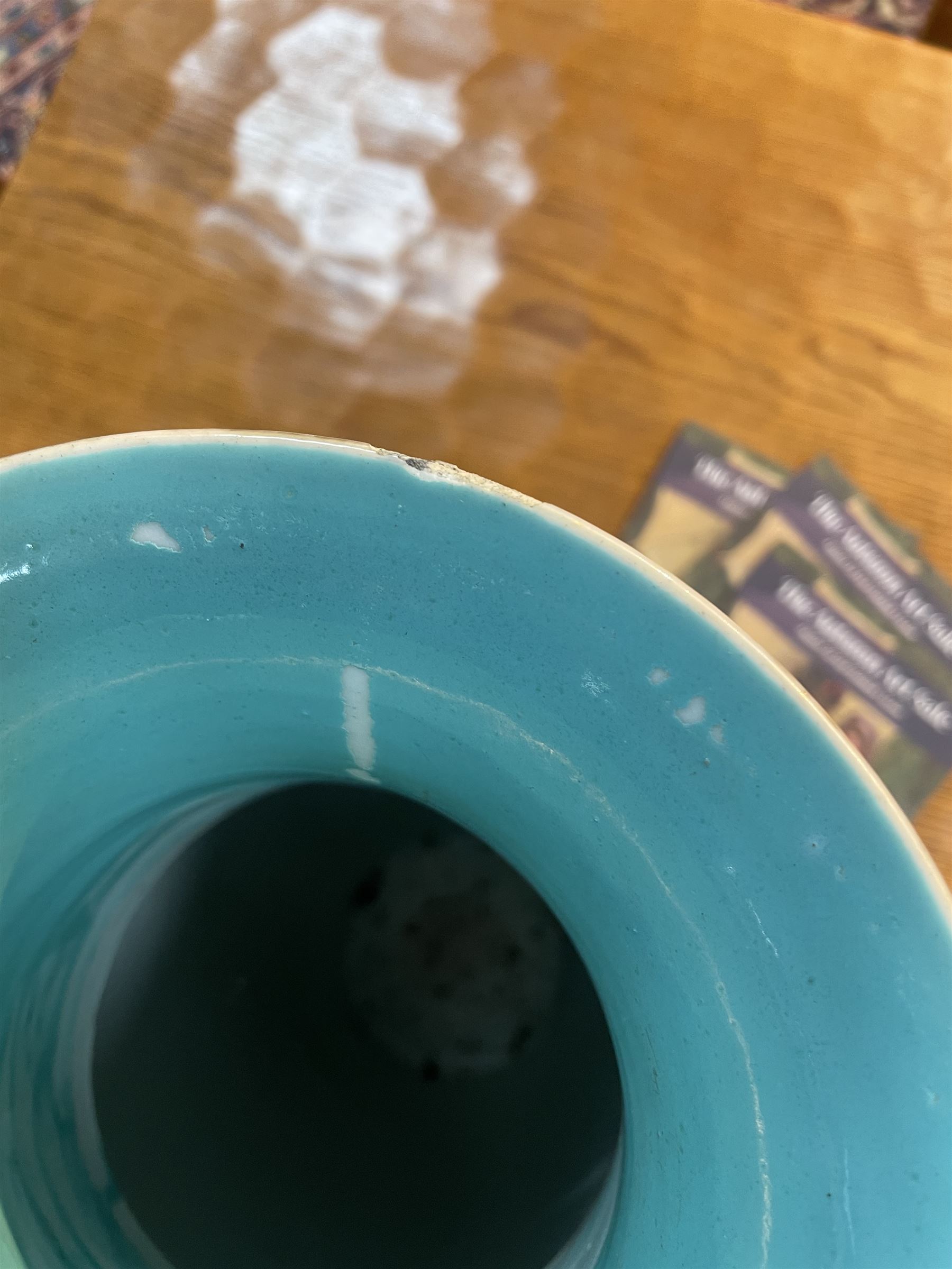 19th century Chinese famille rose yellow ground porcelain vase, of baluster form with twin applied mask ring handles, the body decorated with two shaped reserves mounted with dragon heads, depicting warriors at battle and at court, the neck with two smaller conforming figural reserves, upon a yellow ground decorated with exotic birds amidst scrolling blossom, H45.cm