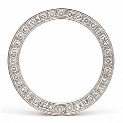 Platinum diamond wedding band, each side set with twenty-eight round brilliant cut diamonds, Sheffield 2000, total diamond weight approx 0.55 carat