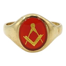9ct gold Masonic ring, the oval carnelian with applied gold square and compass decoration, London 1961