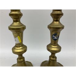 Quantity of Victorian and later brass candlesticks, to include examples of barley twist form 