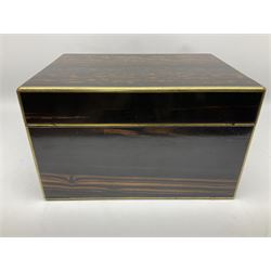19th century brass bound coromandel vanity box, the hinged cover opening to reveal a later blue velvet and black leather fitted interior with lift out tray, above a pull out drawer with blue velvet and blue watered silk lining, the two brass locks stamped Bramah London, for Joseph Bramah of Piccadilly, with key, H20cm L33cm D24cm
